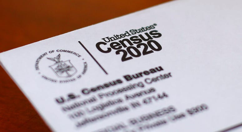 FILE - In this Sunday, April 5, 2020 file photo, An envelope containing a 2020 census letter mailed to a U.S. resident is shown in Detroit. (AP Photo/Paul Sancya, File) FILE - In this Sunday, April 5, 2020 file photo, An envelope containing a 2020 census letter mailed to a U.S. resident is shown in Detroit. (AP Photo/Paul Sancya, File)