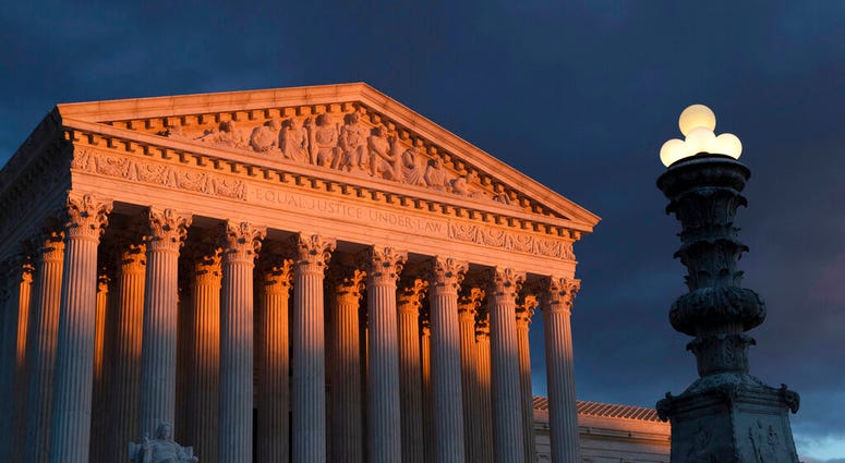 FILE - In this Jan. 24, 2019 file photo, the Supreme Court is seen at sunset in Washington. (AP Photo/J. Scott Applewhite) FILE - In this Jan. 24, 2019 file photo, the Supreme Court is seen at sunset in Washington. (AP Photo/J. Scott Applewhite)
