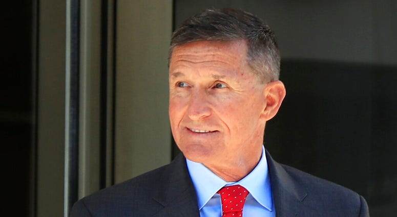 FILE - In this July 10, 2018, file photo, former Trump national security adviser Michael Flynn leaves the federal courthouse in Washington, following a status hearing.