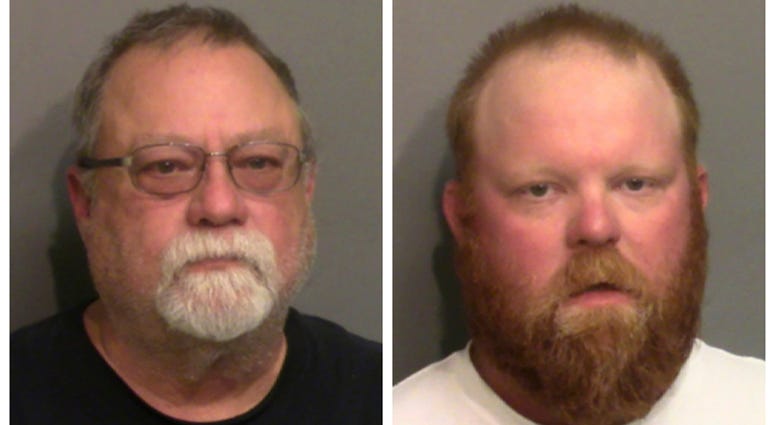This photo combo of images taken Thursday, May 7, 2020, and provided by the Glynn County Detention Center, in Georgia, show Gregory McMichael, left, and his son Travis McMichael.