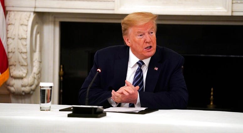 President Donald Trump speaks during a meeting with Republican lawmakers, in the State Dining Room of the White House, Friday, May 8, 2020, in Washington.