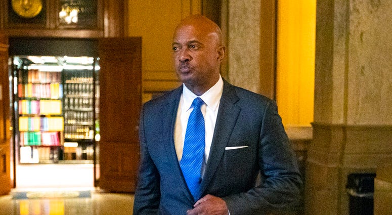 FILE - In this Oct. 23, 2019, file photo, Indiana Attorney General Curtis Hill arrives for a hearing at the state Supreme Court at the Statehouse in Indianapolis. Hill's law license will be suspended for 30 days over an allegation that he drunkenly groped