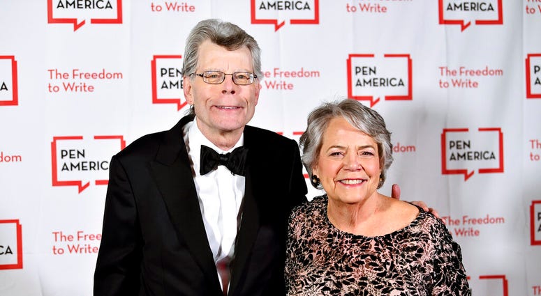 FILE - This May 22, 2018 file photo shows PEN literary service award recipient Stephen King, left, and Simon & Schuster president Carolyn Reidy at the 2018 PEN Literary Gala in New York.