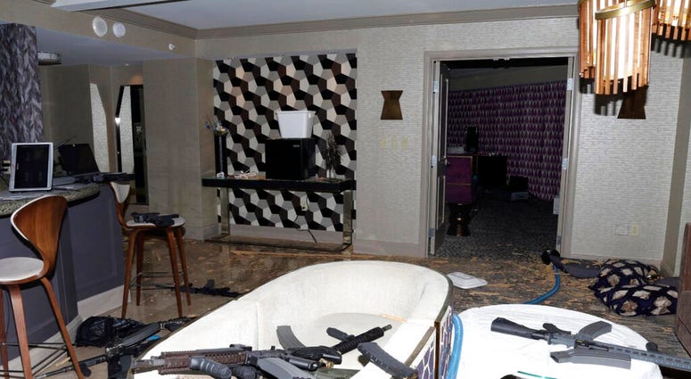 FILE - This October 2017 file photo released by the Las Vegas Metropolitan Police Department Force Investigation Team Report shows the interior of Stephen Paddock's 32nd floor room of the Mandalay Bay hotel in Las Vegas after a mass shooting.