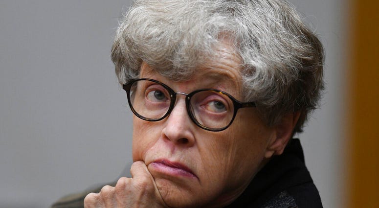 FILE - In this April 9, 2019 file photo, former Michigan State University president Lou Anna Simon appears in court in Charlotte, Mich. A judge has dismissed criminal charges Wednesday, May 13, 2020 against Simon arising from the Larry Nassar sexual assau
