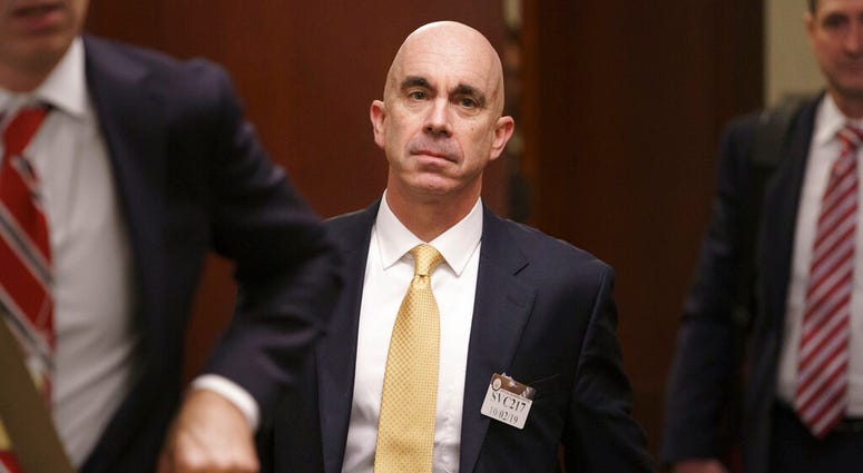 FILE - In this Oct. 2, 2019, file photo State Department Inspector General Steve Linick leaves a meeting in a secure area at the Capitol in Washington.