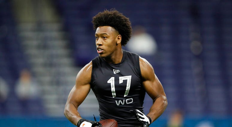FILE - In this Feb. 27, 2020, file photo, Liberty wide receiver Antonio Gandy-Golden runs a drill at the NFL football scouting combine in Indianapolis.