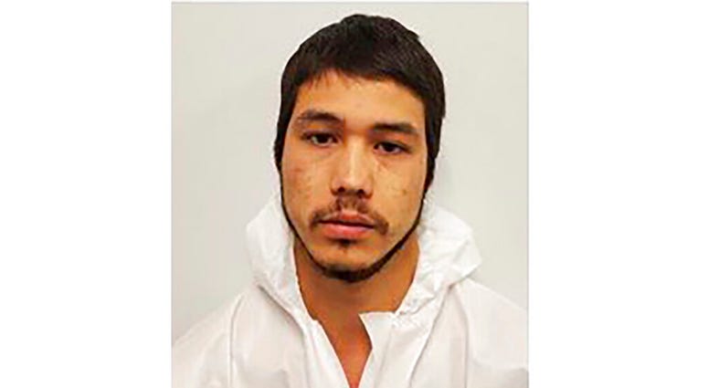 In this Sunday, May, 24, 2020, booking photo released by the Layton Police Department shows suspect, Ethan Hunsaker, 24. He was arrested on suspicion of first degree murder and is being held in the Davis County Jail in Farmington, Utah.