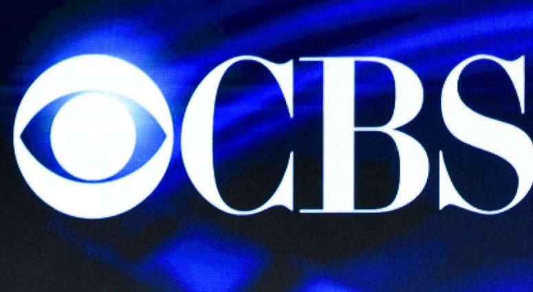 FILE - In this Jan. 12, 2016 file photo, the CBS logo appears onscreen at the Winter TCAs in Pasadena, Calif. (Photo by Richard Shotwell/Invision/AP, File) FILE - In this Jan. 12, 2016 file photo, the CBS logo appears onscreen at the Winter TCAs in Pasadena, Calif. (Photo by Richard Shotwell/Invision/AP, File)