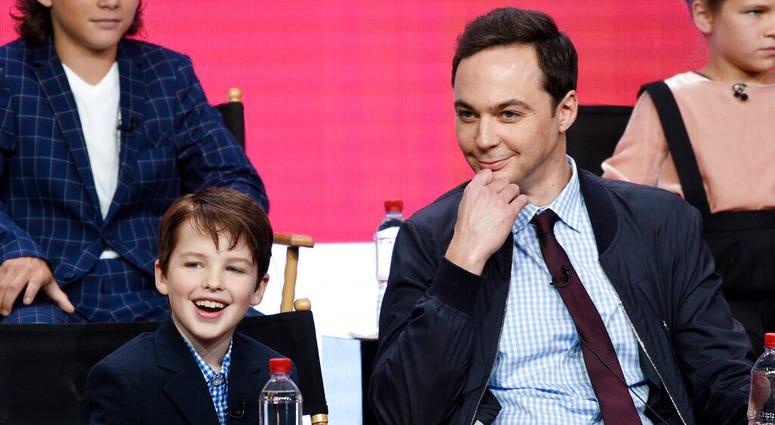 FILER - In this Aug. 1, 2017 file photo, Iain Armitage, left, a cast member in the CBS series "Young Sheldon," answers a question as executive producer/narrator Jim Parsons looks on during a panel discussion at the Television Critics Association Summer Pr