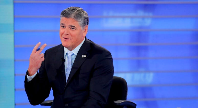 ILE - In this July 26, 2018 file photo, Fox News talk show host Sean Hannity speaks during a taping of his show in New York. Hannity has emerged as a surprise critic of Minneapolis police for their actions in the Memorial Day death of George Floyd. (