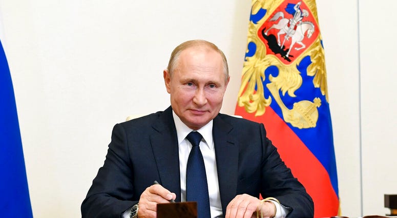 Russian President Vladimir Putin, attends a meeting via teleconference at the Novo-Ogaryovo residence outside Moscow, Russia, Monday, June 1, 2020. Putin set a nationwide vote on constitutional amendments allowing him to extend his rule for July 1.