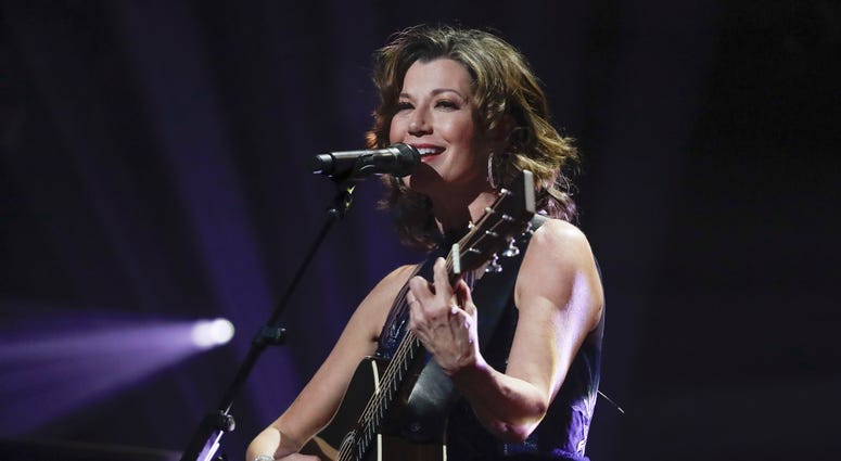 FILE - In this Oct. 15, 2019 file photo, singer Amy Grant performs during the Dove Awards in Nashville, Tenn.