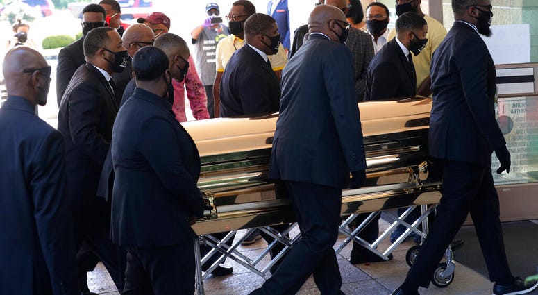 The casket of George Floyd arrives for a public memorial at The Fountain of Praise church in Houston, Monday, June 8, 2020. Floyd died after being restrained by Minneapolis Police officers on May 25. (AP Photo/Eric Gay) The casket of George Floyd arrives for a public memorial at The Fountain of Praise church in Houston, Monday, June 8, 2020. Floyd died after being restrained by Minneapolis Police officers on May 25. (AP Photo/Eric Gay)