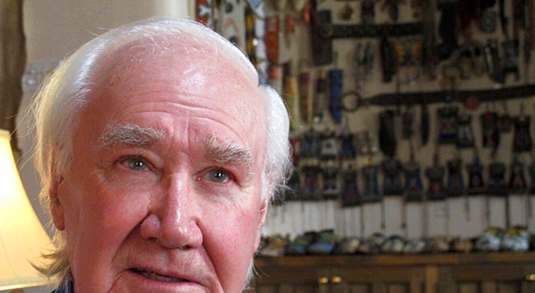 FILE - In this March 22, 2013 file photo, antiquities dealer and author Forrest Fenn poses in his home in Santa Fe, N.M.