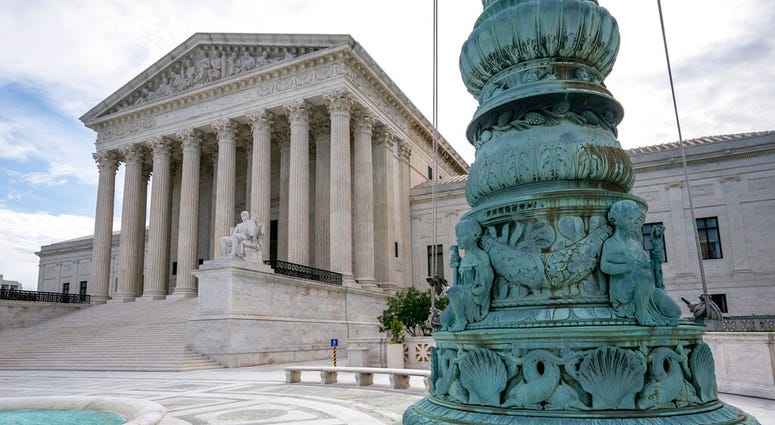 The Supreme Court is seen in Washington, early Monday, June 15, 2020. (AP Photo/J. Scott Applewhite) The Supreme Court is seen in Washington, early Monday, June 15, 2020. (AP Photo/J. Scott Applewhite)