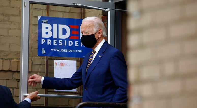 Democratic presidential candidate, former Vice President Joe Biden arrives at Carlette's Hideaway, a soul food restaurant, to speak with small business owners, Wednesday, June 17, 2020, in Yeadon, Pa.