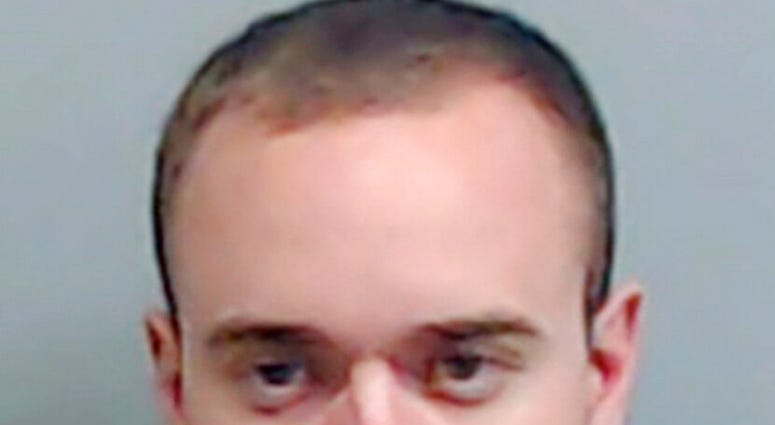 In this booking photo made available Thursday, June 18, 2020 by the Fulton County, Ga., Sheriff's Office, shows Atlanta Police Officer Garrett Rolfe. (Fulton County Sheriff's Office via AP) In this booking photo made available Thursday, June 18, 2020 by the Fulton County, Ga., Sheriff's Office, shows Atlanta Police Officer Garrett Rolfe. (Fulton County Sheriff's Office via AP)