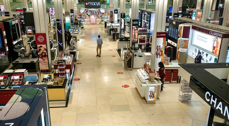 Workers prepare for the reopening of the Macy's Herald Square location Friday, June 19, 2020, in New York. (AP Photo/Frank Franklin II) Workers prepare for the reopening of the Macy's Herald Square location Friday, June 19, 2020, in New York. (AP Photo/Frank Franklin II)
