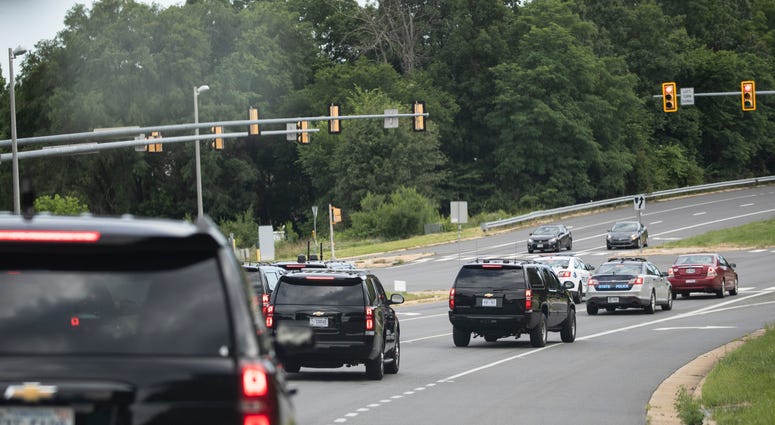 The motorcade for President Donald Trump travels en route to Trump National Golf Club, Sunday, June 28, 2020, in Sterling, Va.