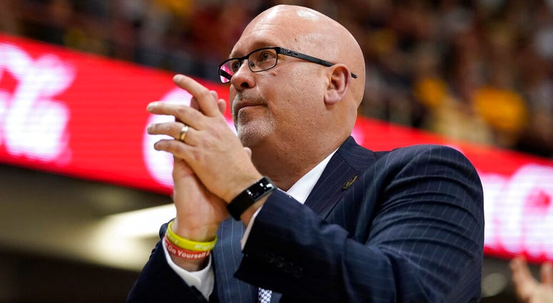 FILE - In this March 9, 2020, file photo, then-East Tennessee State head coach Steve Forbes applauds his team during an NCAA men's college basketball championship game against Wofford in the Southern Conference tournament, in Asheville, N.C.