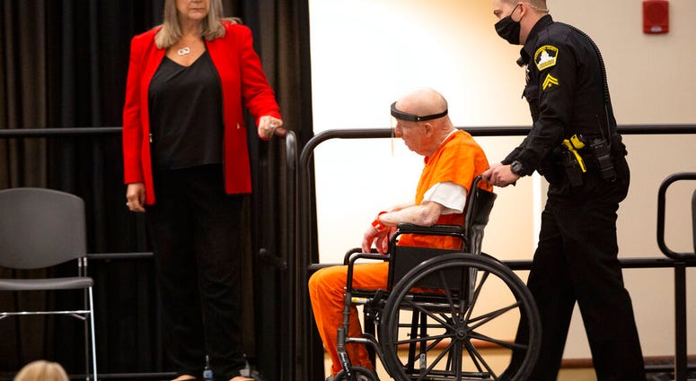 Joseph James DeAngelo, charged with being the Golden State Killer, is wheeled into the courtroom as his attorney, public defender Diane Howard, left, looks on in Sacramento, Calif., Monday June 29, 2020.