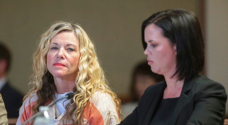 FILE - In this March 6, 2020, file photo, Lori Vallow Daybell glances at the camera during her hearing, with her defense attorney, Edwina Elcox, right, in Rexburg, Idaho.