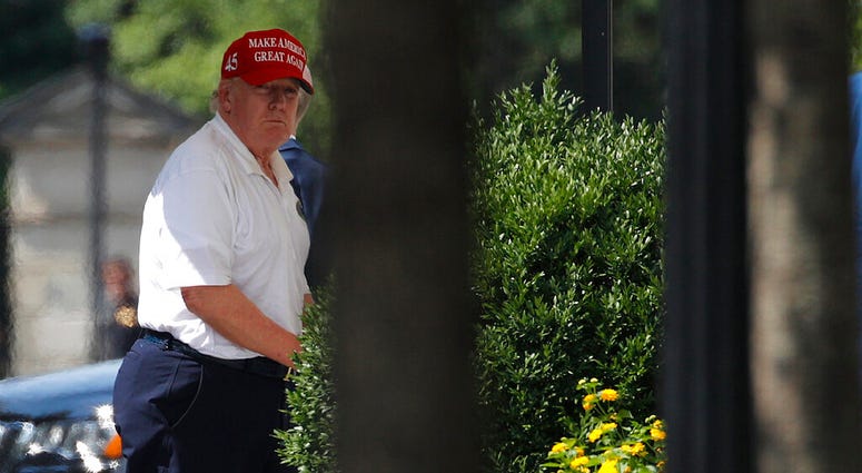 President Donald Trump arrives at the White House, Sunday, July 5, 2020, in Washington after visiting Trump National Golf Club in Sterling, Va. (AP Photo/Patrick Semansky) President Donald Trump arrives at the White House, Sunday, July 5, 2020, in Washington after visiting Trump National Golf Club in Sterling, Va. (AP Photo/Patrick Semansky)