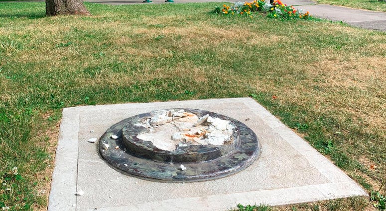 This photo provided by WROC-TV shows the remnants of a Frederick Douglass statue ripped from its base at a park in Rochester, N.Y., Sunday, July 5, 2020.