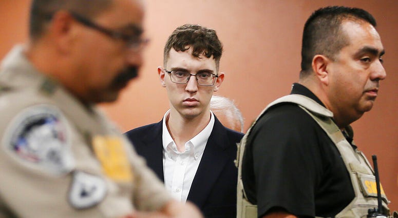 FILE - In this Oct. 10, 2019 file photo, El Paso Walmart shooting suspect Patrick Crusius pleads not guilty during his arraignment in El Paso, Texas.