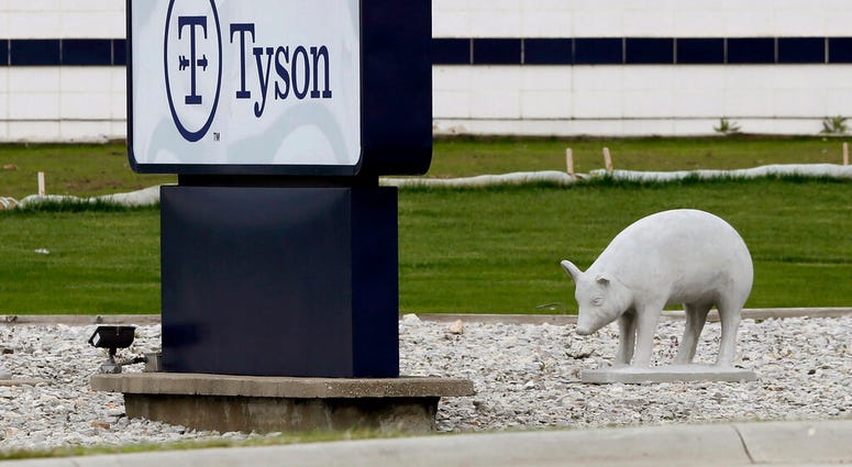 In this May 1, 2020, file photo, a sign sits in front of the Tyson Foods plant in Waterloo, Iowa.