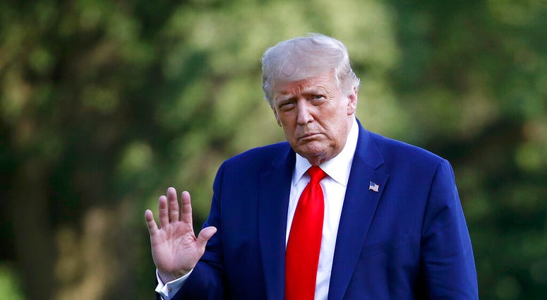 President Donald Trump walks on the South Lawn of the White House in Washington, Wednesday, July 15, 2020, after stepping off Marine One. Trump is returning from Atlanta.