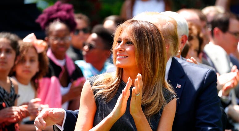 FILE - In this May 7, 2019 file photo, first lady Melania Trump attends a one year anniversary event for her Be Best initiative in the Rose Garden of the White House in Washington. (AP Photo/Andrew Harnik) FILE - In this May 7, 2019 file photo, first lady Melania Trump attends a one year anniversary event for her Be Best initiative in the Rose Garden of the White House in Washington. (AP Photo/Andrew Harnik)