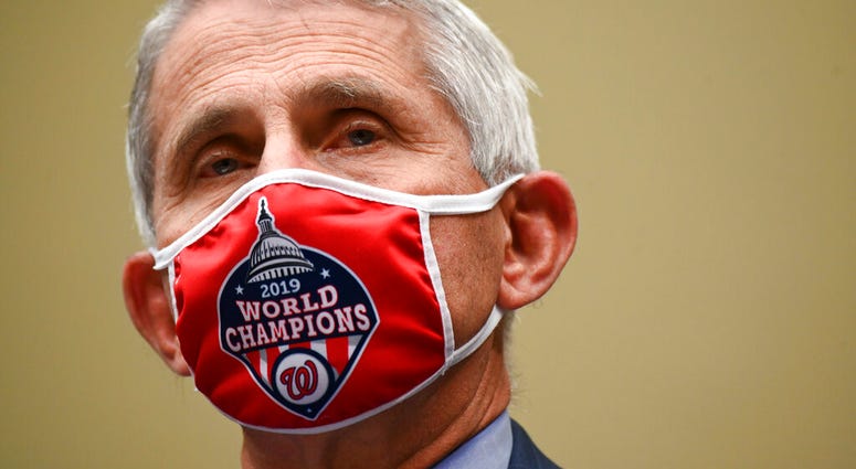 Dr. Anthony Fauci, director of the National Institute for Allergy and Infectious Diseases, arrives to a House Select Subcommittee hearing on the Coronavirus, Friday, July 31, 2020 on Capitol Hill in Washington. (Erin Scott/Pool via AP) Dr. Anthony Fauci, director of the National Institute for Allergy and Infectious Diseases, arrives to a House Select Subcommittee hearing on the Coronavirus, Friday, July 31, 2020 on Capitol Hill in Washington. (Erin Scott/Pool via AP)