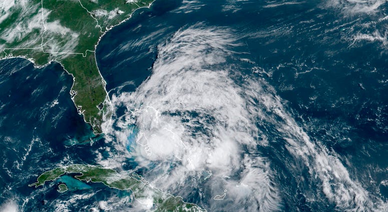 This GOES-16 GeoColor satellite image taken Saturday, Aug. 1, 2020, at 9:40 a.m. EDT., and provided by NOAA, shows Hurricane Isaias over the Bahamas.