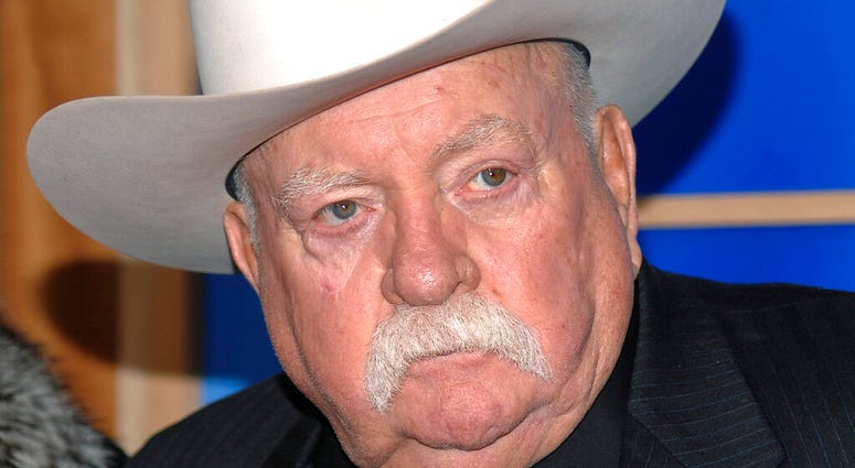 FILE - In this Monday, Dec. 14, 2009 file photo, Actor Wilford Brimley attends the premiere of 'Did You Hear About The Morgans' at the Ziegfeld Theater in New York.