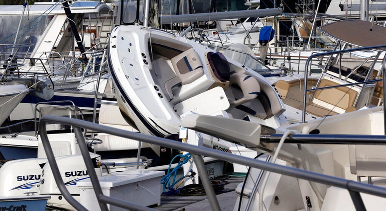 Boats are piled on each other at the Southport Marina following the effects of Hurricane Isaias in Southport, N.C., Tuesday, Aug. 4, 2020.