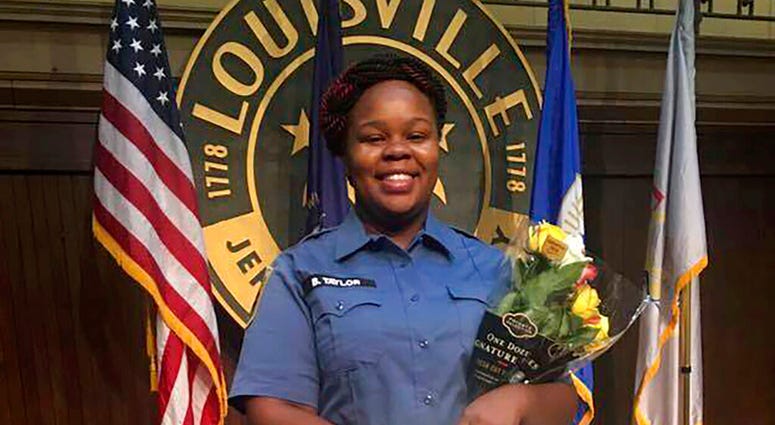 FILE - This undated photo provided by Taylor family attorney Sam Aguiar shows Breonna Taylor in Louisville, Ky. (Courtesy of Taylor Family attorney Sam Aguiar via AP, File) FILE - This undated photo provided by Taylor family attorney Sam Aguiar shows Breonna Taylor in Louisville, Ky. (Courtesy of Taylor Family attorney Sam Aguiar via AP, File)