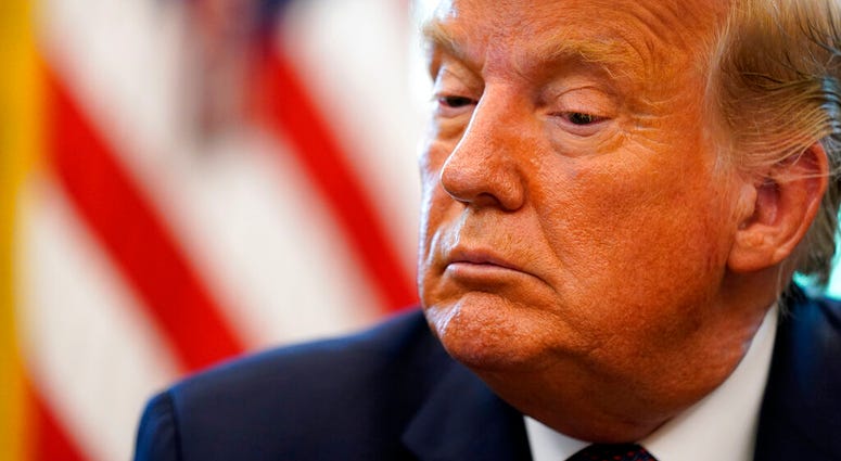 President Donald Trump listens in the Oval Office of the White House on Friday, Sept. 11, 2020, in Washington. (AP Photo/Andrew Harnik) President Donald Trump listens in the Oval Office of the White House on Friday, Sept. 11, 2020, in Washington. (AP Photo/Andrew Harnik)