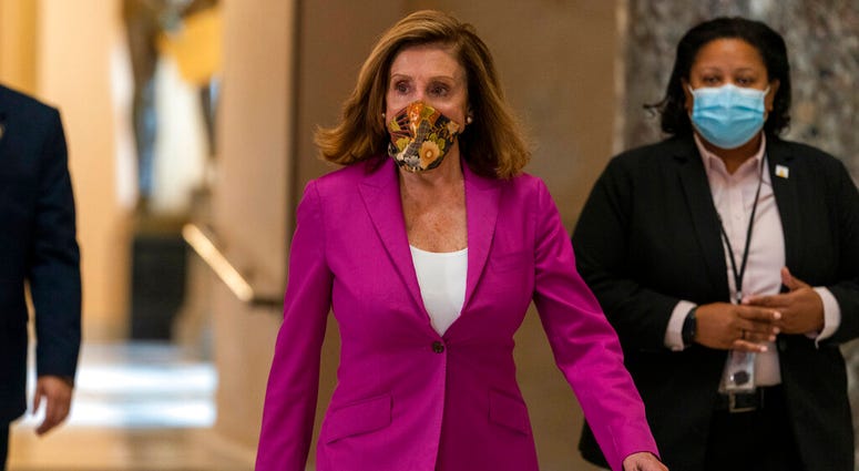 House Speaker Nancy Pelosi of Calif., walks to her office, Monday, Sept. 14, 2020, on Capitol Hill in Washington. (AP Photo/Jacquelyn Martin) House Speaker Nancy Pelosi of Calif., walks to her office, Monday, Sept. 14, 2020, on Capitol Hill in Washington. (AP Photo/Jacquelyn Martin)