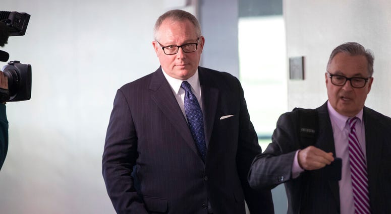Former Donald Trump campaign official Michael Caputo, left, joined by his attorney Dennis C. Vacco in 2018. (AP Photo/J. Scott Applewhite, File) Former Donald Trump campaign official Michael Caputo, left, joined by his attorney Dennis C. Vacco in 2018. (AP Photo/J. Scott Applewhite, File)