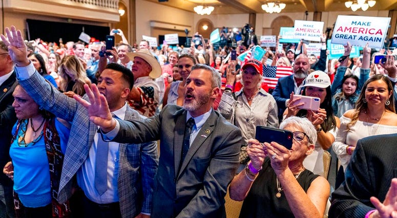 Supporters react as President Donald Trump speaks at a Latinos for Trump Coalition roundtable at Arizona Grand Resort & Spa, Monday, Sept. 14, 2020, in Phoenix. (AP Photo/Andrew Harnik) Supporters react as President Donald Trump speaks at a Latinos for Trump Coalition roundtable at Arizona Grand Resort & Spa, Monday, Sept. 14, 2020, in Phoenix. (AP Photo/Andrew Harnik)