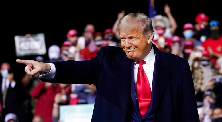 President Donald Trump wraps up his speech at a campaign rally at Fayetteville Regional Airport, Saturday, Sept. 19, 2020, in Fayetteville, N.C. (AP Photo/Evan Vucci) President Donald Trump wraps up his speech at a campaign rally at Fayetteville Regional Airport, Saturday, Sept. 19, 2020, in Fayetteville, N.C. (AP Photo/Evan Vucci)