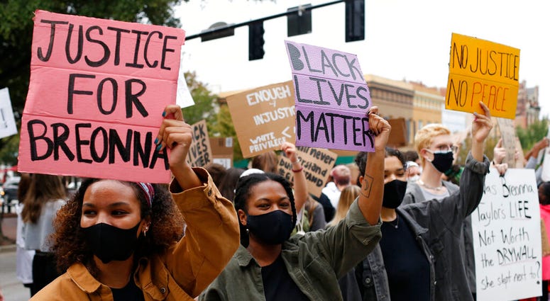 University of Georiga students lead a Black Lives Matter protest in downtown in memory of Breonna Taylor in Athens, Ga., Friday, Sept. 25, 2020. (Joshua L. Jones/Athens Banner-Herald via AP) University of Georiga students lead a Black Lives Matter protest in downtown in memory of Breonna Taylor in Athens, Ga., Friday, Sept. 25, 2020. (Joshua L. Jones/Athens Banner-Herald via AP)