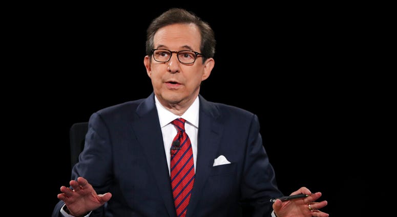 FILE - In this Oct. 19, 2016 file photo, moderator Chris Wallace guides the discussion during the presidential debate at UNLV in Las Vegas. (Joe Raedle/Pool via AP, File) FILE - In this Oct. 19, 2016 file photo, moderator Chris Wallace guides the discussion during the presidential debate at UNLV in Las Vegas. (Joe Raedle/Pool via AP, File)