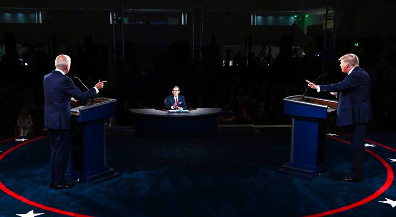 President Donald Trump and Democratic presidential candidate former Vice President Joe Biden participate in the first presidential debate Tuesday, Sept. 29, 2020, at Case Western University and Cleveland Clinic, in Cleveland. (Olivier Douliery/Pool vi AP) President Donald Trump and Democratic presidential candidate former Vice President Joe Biden participate in the first presidential debate Tuesday, Sept. 29, 2020, at Case Western University and Cleveland Clinic, in Cleveland. (Olivier Douliery/Pool vi AP)