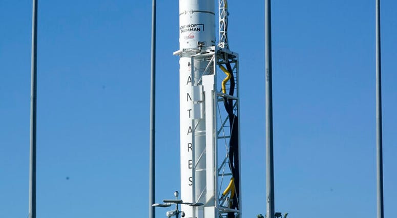Northrup Grumman's Antares rocket is poised for launch at the NASA Wallops test flight facility Thursday, Oct. 1, 2020, in Wallops Island, Va. (AP Photo/Steve Helber) Northrup Grumman's Antares rocket is poised for launch at the NASA Wallops test flight facility Thursday, Oct. 1, 2020, in Wallops Island, Va. (AP Photo/Steve Helber)