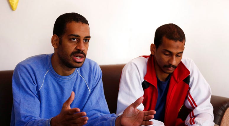 FILE - In this March 30, 2019, file photo, Alexanda Amon Kotey, left, and El Shafee Elsheikh, who were allegedly among four British jihadis who made up a brutal Islamic State Speak during an interview with The Associated Press. (AP Photo/Hussein Malla,Fi) FILE - In this March 30, 2019, file photo, Alexanda Amon Kotey, left, and El Shafee Elsheikh, who were allegedly among four British jihadis who made up a brutal Islamic State Speak during an interview with The Associated Press. (AP Photo/Hussein Malla,Fi)