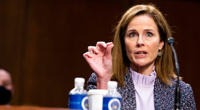 Supreme Court nominee Amy Coney Barrett speaks during a confirmation hearing before the Senate Judiciary Committee, Wednesday, Oct. 14, 2020, on Capitol Hill in Washington. (Anna Moneymaker/The New York Times via AP, Pool) Supreme Court nominee Amy Coney Barrett speaks during a confirmation hearing before the Senate Judiciary Committee, Wednesday, Oct. 14, 2020, on Capitol Hill in Washington. (Anna Moneymaker/The New York Times via AP, Pool)