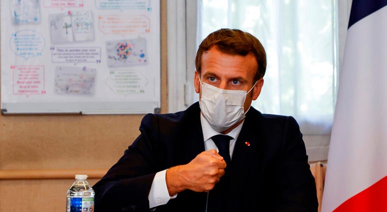 French President Emmanuel Macron chairs a meeting with the medical staff of the Rene Dubos hospital center, in Pontoise, outside Paris, Friday Oct. 23, 2020. (Photo by Ludovic Marin, Pool via AP) French President Emmanuel Macron chairs a meeting with the medical staff of the Rene Dubos hospital center, in Pontoise, outside Paris, Friday Oct. 23, 2020. (Photo by Ludovic Marin, Pool via AP)